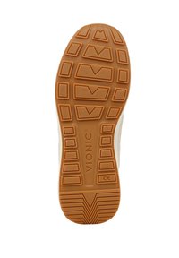 Vionic shoe outsole in tan rubber, featuring a patterned tread with gripping textures and a logo imprint in the midsection.