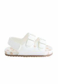 White sandal with two adjustable Velcro straps. Textured sole features a minimal rainbow pattern. Lightweight design with a flat profile.