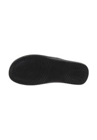 Suola nera di scarpa con aree di grip testurizzate sul tallone e sulla pianta, mostrata piatta su uno sfondo bianco.