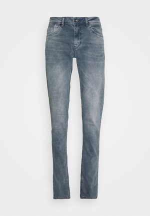 Denim jeans in een vervaagde blauwe kleur, slim fit met een middelhoge taille. Bevat vijf zakken, een metalen knoopsluiting en subtiele wassingdetails.