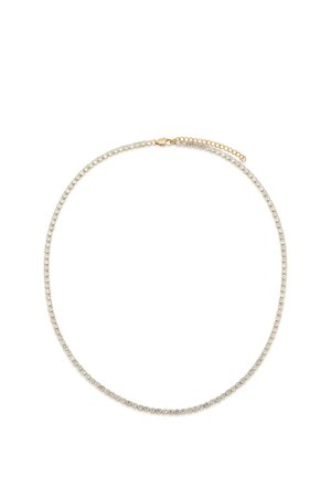 Thin gold necklace with small round clear stones and adjustable chain clasp on white background.