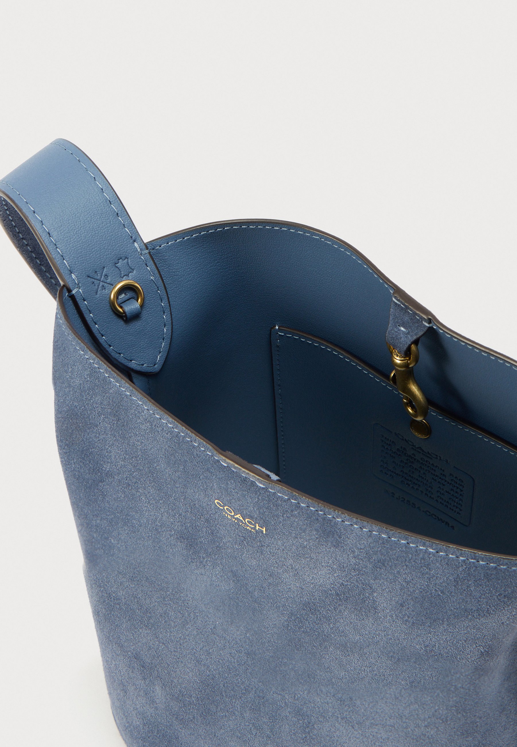 COACH BLEECKER BUCKET BAG - Cross body bag - light blue - Zalando