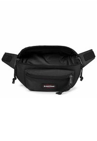 Mustahiilukang musta na may nababagay na strap, harapang bulsa na may siper, at tatak na logo patch. Ang loob ay may maluwang na compartment.