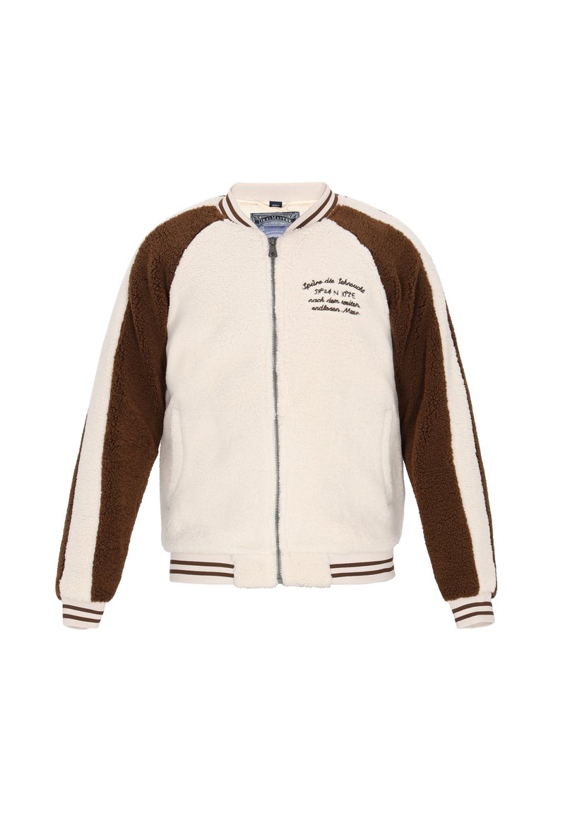 Puszysta, kremowa kurtka z brązowymi akcentami. Posiada zamek błyskawiczny, prążkowany kołnierz i mankiety oraz przeszycie na klatce piersiowej.