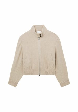 Texturált anyagból készült, bézs színű rövid dzseki. Cipzáras lezárással, magas nyakkal és két elülső zsebbel rendelkezik, az alsó szegély bordázott részlettel.