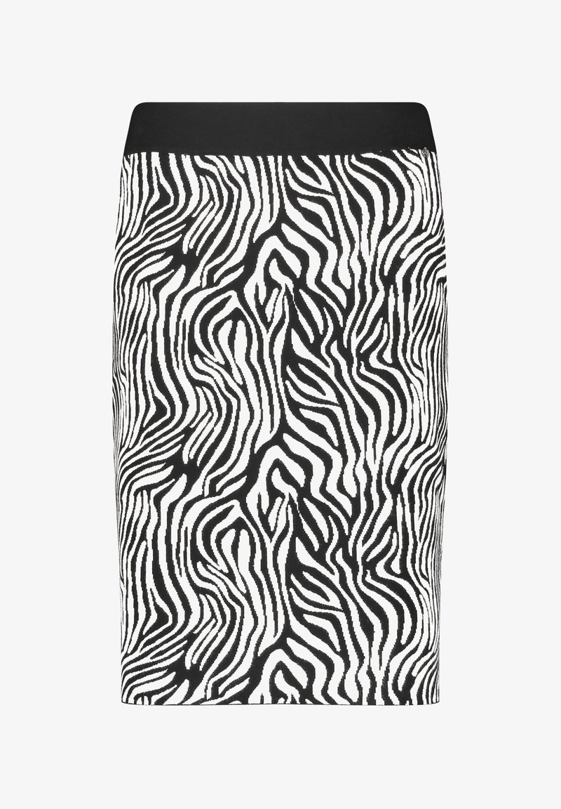 Falda en blanco y negro con un patrón de cebra ondulado, que cuenta con una cinturilla negra sólida. Hecha de material suave y elástico.