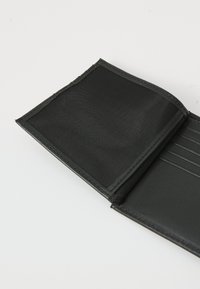 Black wallet with a textured exterior, featuring a mesh pocket on one side and card slots on the other. Stitched edges provide durability.