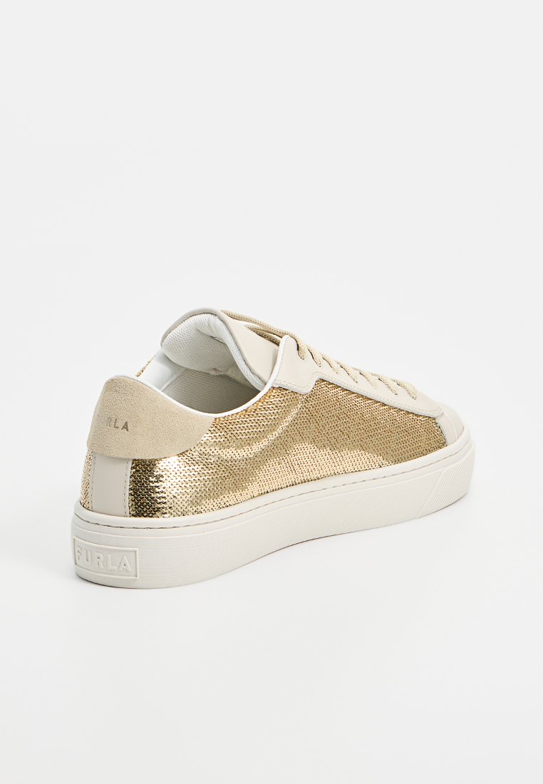 Zapatillas con patrón dorado, con una lengüeta y cordones de cuero crema suave, que presentan un upper texturizado y una suela blanca robusta. Logo en el talón.