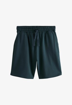 Tumši zaļi sporta šorti no mīksta auduma, ar elastīgu jostu un aukliņu, un sānu kabatām, ar tīrām un vienkāršām līnijām.