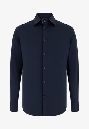 Marineblauw shirt met lange mouwen van gladde stof, met een puntkraag, knoopsluiting aan de voorkant en boordjes met knopen.