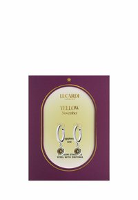 Silberne Creolen mit Tropfendetail und einem gelben Zirkoniastein, präsentiert auf einer lila und goldenen Karte mit dem Titel "Gelbes November."