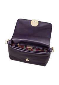 Leather handbag in deep purple with a smooth texture. Features a gold circular clasp and patterned fabric lining in shades of pink and grey.