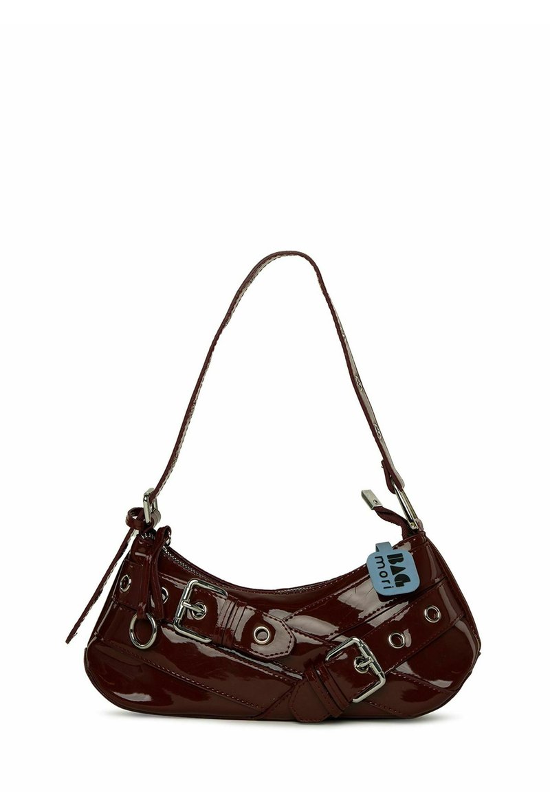 Burgundy patent leather handbag with a curved shape, silver hardware accents, and a decorative buckle. Features a short strap and zipper closure.
