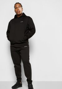Calvin Klein MICRO LOGO JOGGER - Træningsbukser - black