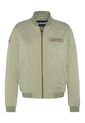 Veste bomber vert olive en tissu doux, avec fermeture éclair à l'avant, poignets côtelés et un patch logo sur la poitrine. Deux poches latérales.