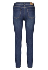 Tmavě modré džíny z denimu s úzkým střihem, designem se pěti kapsami a kontrastním prošíváním. Na zadním pásku mají hnědou koženou nášivku.