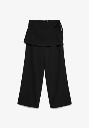 Pantalon noir à jambes larges avec surjupe style portefeuille attachée par un nœud à la taille, étalé à plat sur fond blanc.