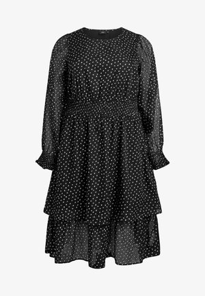 Crna haljina s uzorkom srebrnih točkica, smočeni struk, duge rukave i višeslojnu suknju. Lagana tkanina s teksturiranim finišom.