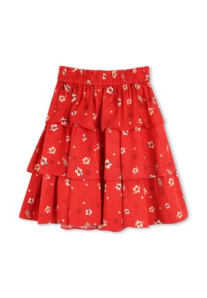 Red tiered skirt made of lightweight fabric. Features floral and geometric patterns, with an elastic waistband for comfort.