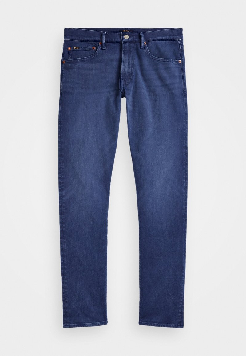 Mörkblå denimjeans med slim fit, som har fem fickor, dragkedja och en logotags på midjan. Slät textur, minimal blekning.