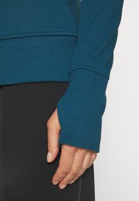 Athleta TRIUMPH HOODIE - Camisola com fecho - dark sardinia blue