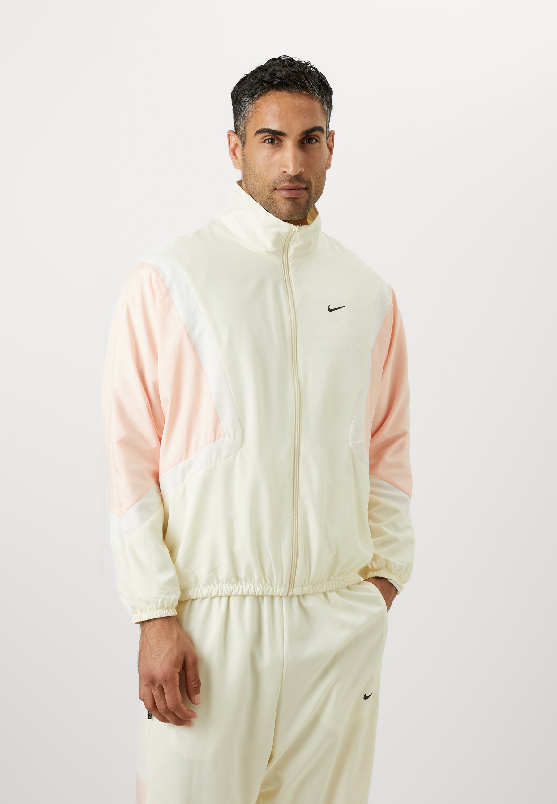 nike swoosh coconut milk tracksuit