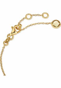 Guld kedjebracelet med en kräftsklämma, länkar och en rund fasetterad stené accent. Slät finish med cirkulära dekorationer.