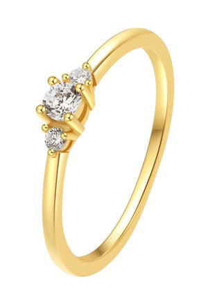 Gold ring with three round, clear gemstones set in a polished, smooth band. Features rounded edges and a delicate design.