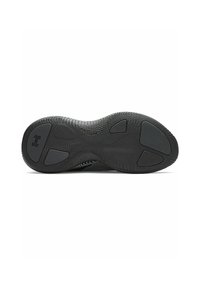 Black athletic shoe sole with textured grip pattern, circular and oval rubber accents, smooth edge, and Under Armour logo on the heel.