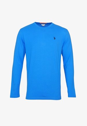 T-shirt à manches longues bleu en coton ; doté d'un col rond et d'un petit logo noir sur la poitrine. Texture douce, design simple.