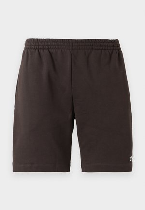 Sorte bomullsshorts med elastisk midje, sidesøm detaljer og en liten logo aksent på venstre nederste ben.