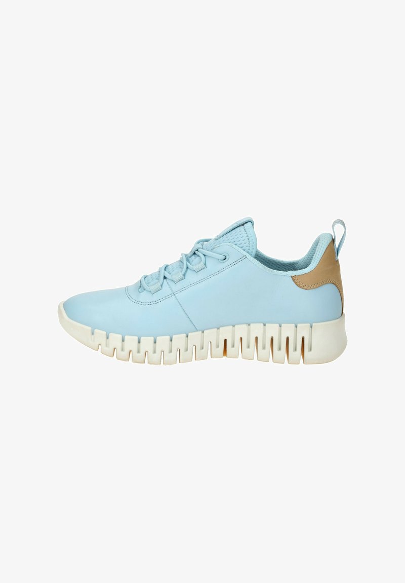 Light blue sneaker with smooth leather upper, textured mesh lining, and contrasting tan heel accent. Distinctive ridged white sole.