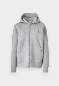 Šedá mikina na zips vyrobená z jemného materiálu, s kapucňou na šnúrku a logom vyšitým na ľavej strane hrude. Predný zips na uzatváranie.