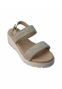 Sandali platform beige con cinturini in tessuto intrecciato, fibbia regolabile e suola in gomma testurizzata, che offrono una morbida soletta imbottita.