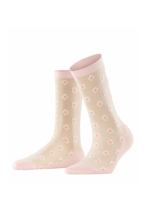 Calzini beige chiaro con polsini, talloni e punte rosa, con un motivo ripetuto di piccoli fiori rosa e bianchi.