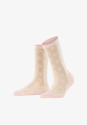 Lichtbeige sokken met roze boorden, hielen en tenen, met een herhalend patroon van kleine roze en witte bloemen.