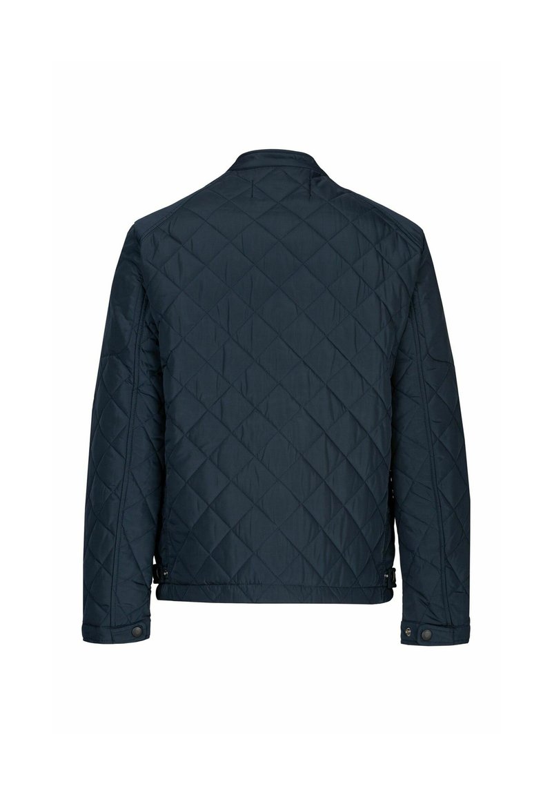 Giacca trapuntata blu navy con motivo a diamante e colletto alto. Presenta bottoni a pressione sui polsini e zip laterali all'orlo.