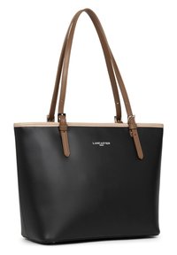 Sac fourre-tout noir en matériau synthétique lisse, avec des poignées en cuir beige et une bordure beige. Décoré d'un logo argenté à l'avant.