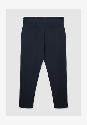 Pantaloni della tuta blu navy con vestibilità comoda, dotati di vita elasticizzata, due tasche posteriori e polsini risvoltati alle caviglie.