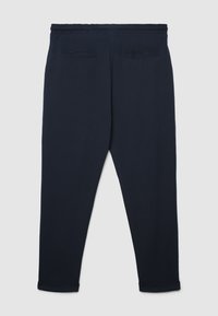 Marineblaue Jogginghose mit lockerem Schnitt, elastischem Bund, zwei Gesäßtaschen und umgeschlagenen Bündchen an den Knöcheln.