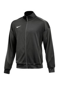 Zwarte Nike trainingsjack met ritssluiting, opstaande kraag, lange mouwen en zijzakken. Gemaakt van soepel, lichtgewicht polyesterstof.