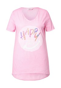 Camiseta de algodón rosa con cuello en V y mangas cortas. Cuenta con un gráfico colorido de lentejuelas que dice "SOLO BUENAS VIBRACIONES" en el frente.