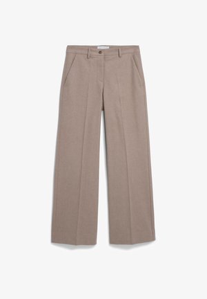 Beige wijdvallende broek gemaakt van een gestructureerde stof met een knoopsluiting en voorzakken. Heeft een op maat gemaakt ontwerp en strakke lijnen.