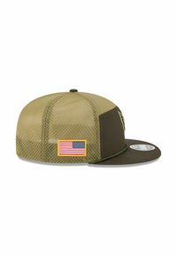 Olive green cap with a flat brim, mesh back, and textured pattern. Features a patch with the American flag on the side.