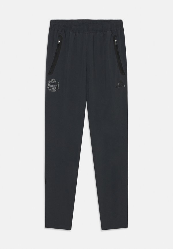 FC BAYERN MUENCHEN TIRO UNISEX - Tracksuit bottoms - carbon