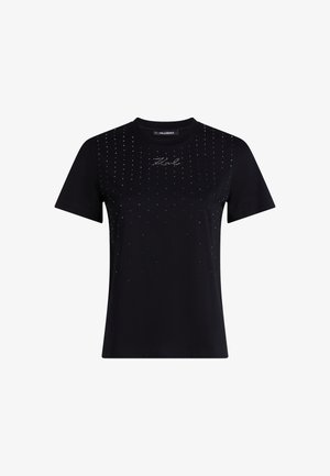 Camiseta de algodón negra con cuello redondo, mangas cortas y acentos de rhinestones dispersos en la parte frontal, con un detalle de logo centrado.