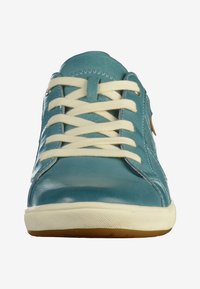 Turquoise leather sneaker with white laces, round toe, and a rubber sole featuring a textured grip; side detail showcases a brown leather accent.