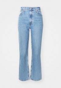 Light blue high-waisted jeans with a flared leg. Made of denim, featuring five pockets and a button front closure. Faded texture.