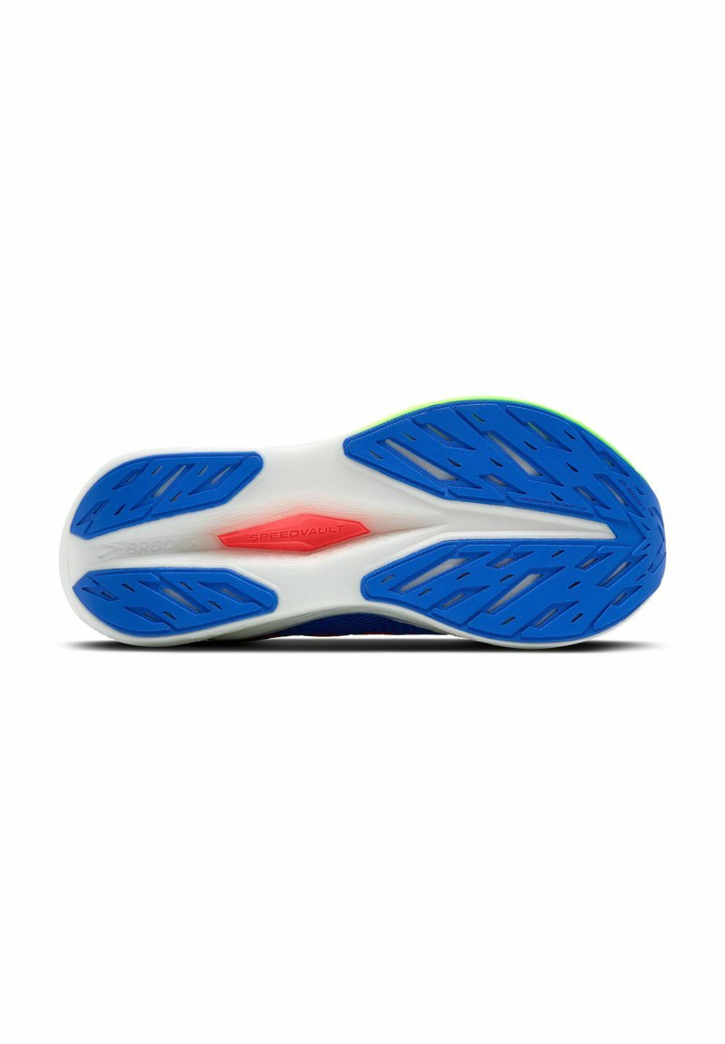 La suela de la zapatilla de correr presenta patrones de tracción azules, una media suela blanca con acentos rojos y detalles verdes a lo largo de los bordes.