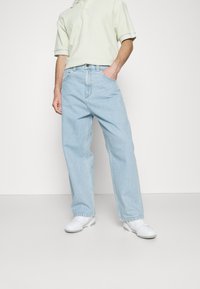 Carhartt WIP BRANDON PANT - Vaqueros baggy - blue